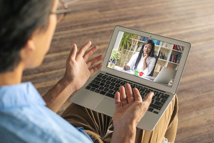 man uses telehealth